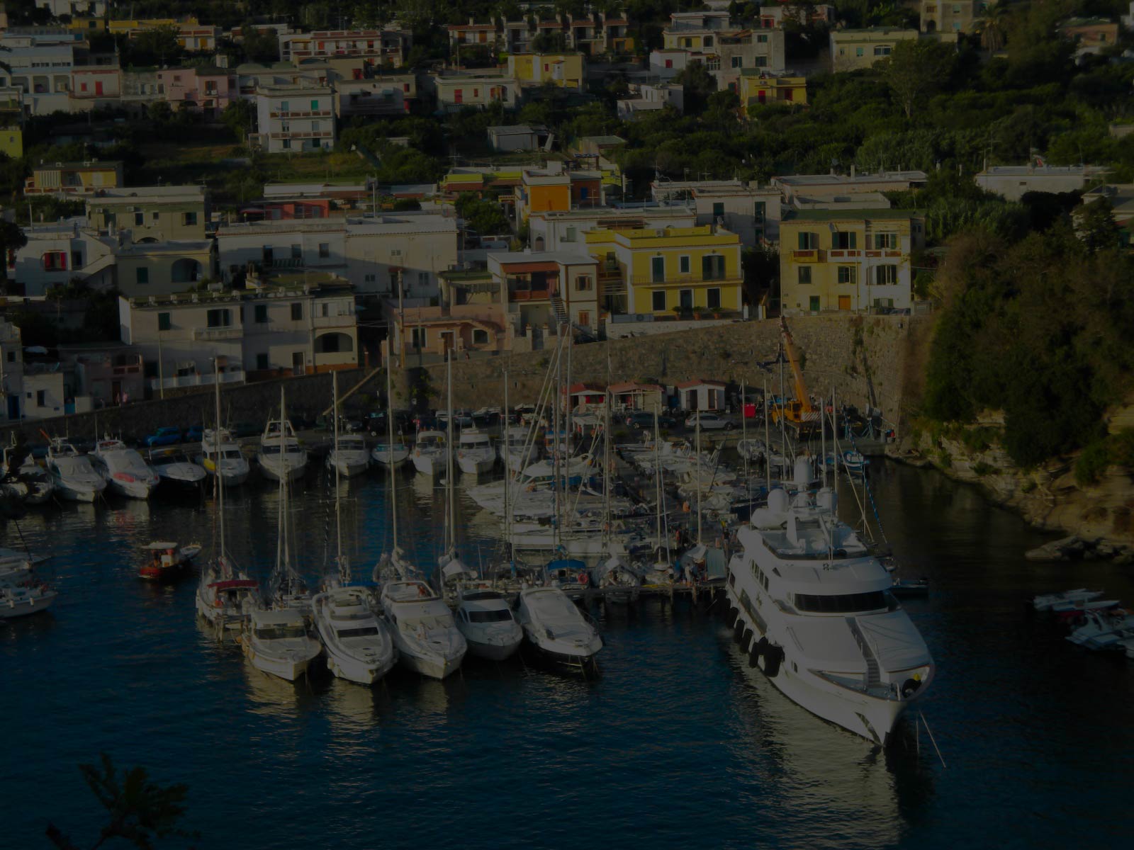 The harbor of Procida at sunset